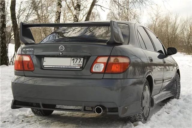 Спойлеры ниссан альмера. Nissan Almera n16 Tuning. Nissan Almera n16 обвес. Спойлер на Ниссан Альмера н16. Обвес Альмера н16.