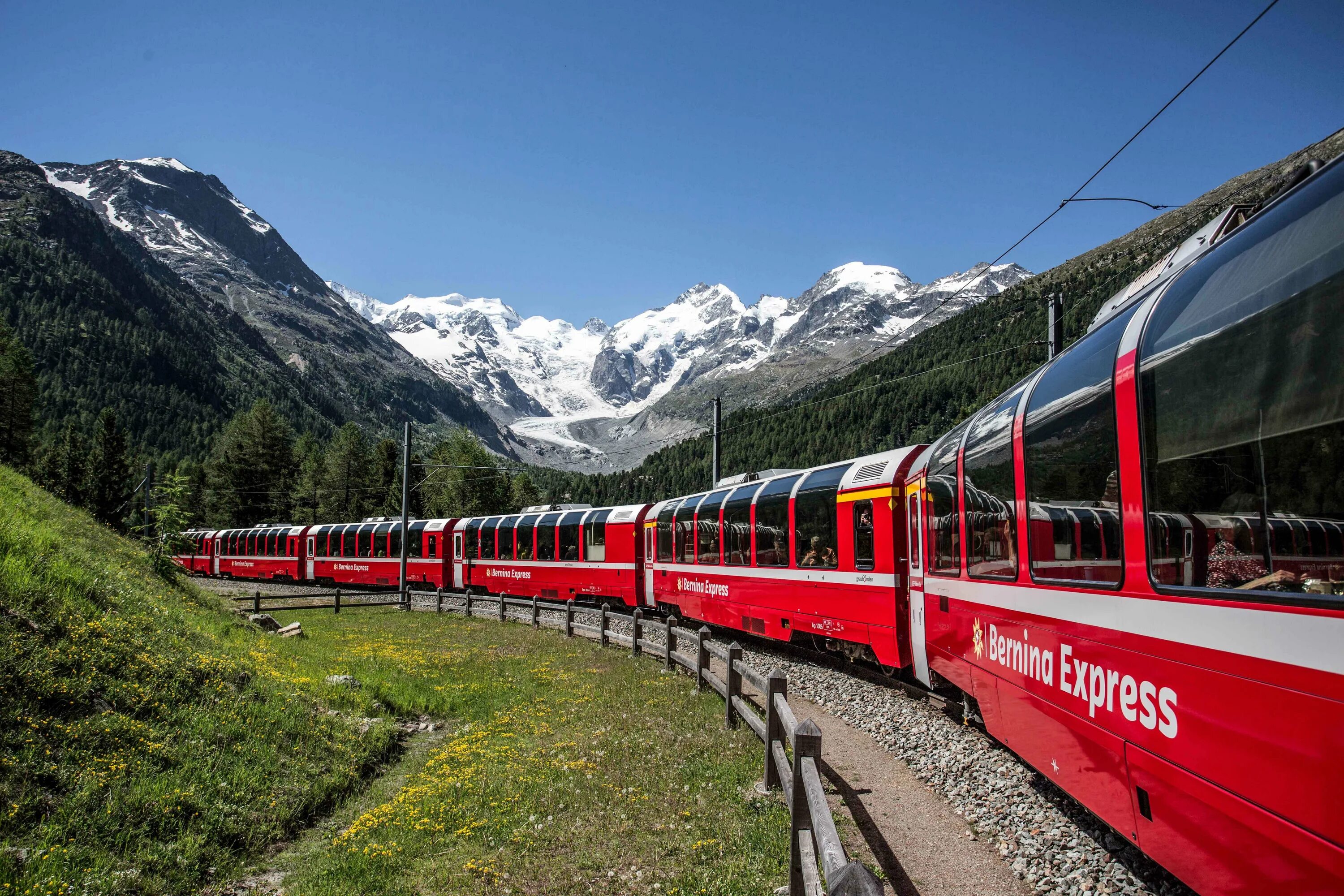 Ретийская железная дорога Швейцария. Bernina Express Швейцария. Санкт-Мориц Швейцария железная дорога. Бернина экспресс панорамный вагон. Путешествие на поезде на английском