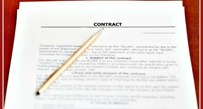 The contract has been signed. Contract on the table art. notes on the contract.