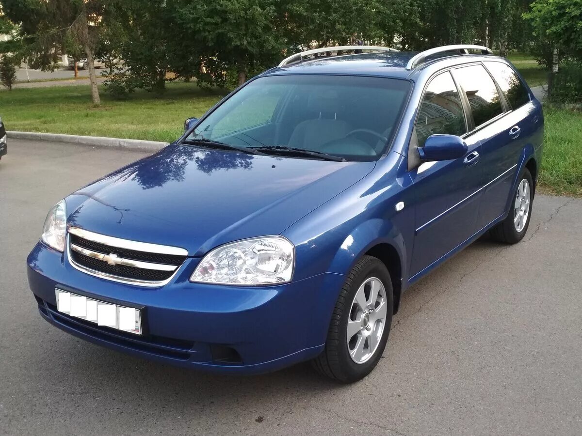 Автомобиль шевроле универсал. Chevrolet Lacetti 2008 универсал. Шевроле Лачетти универсал 1.6. Chevrolet Lacetti универсал 1.6 2011. Chevrolet Lacetti универсал 1.6 2008.