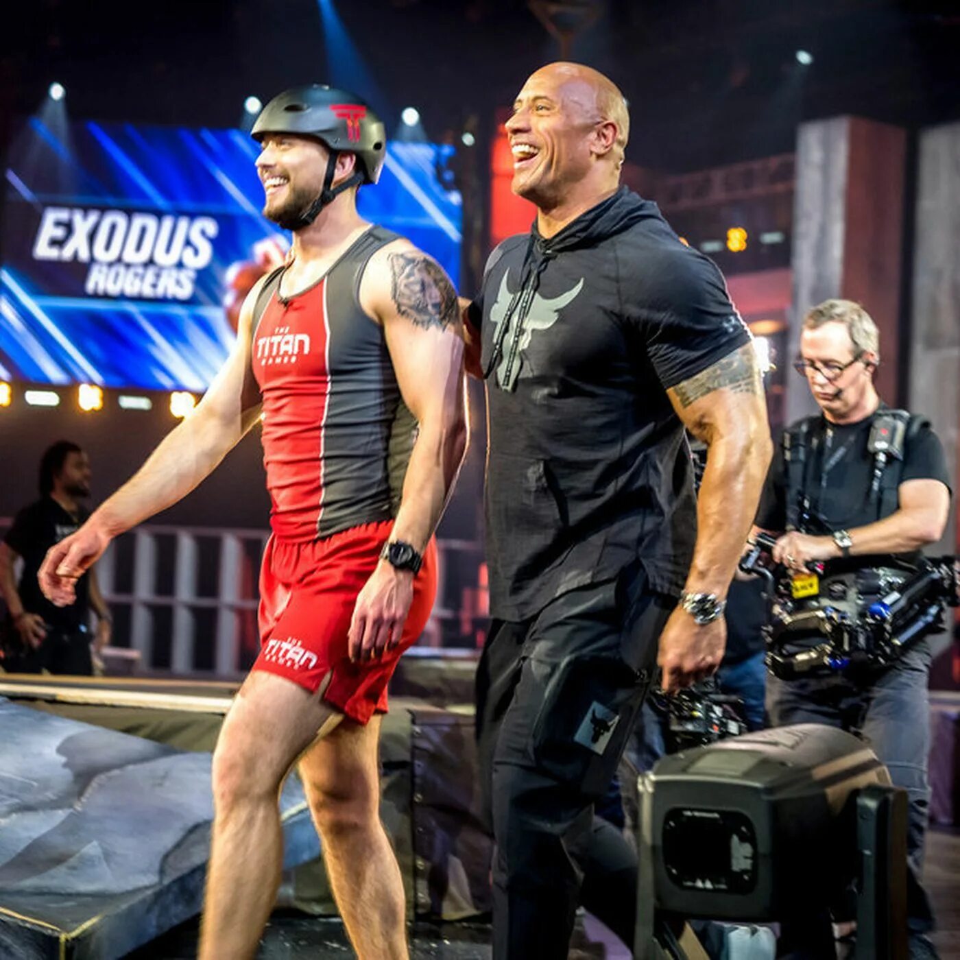 Игры титанов дуэйн джонсон. Игры титанов дуэйн джонсон. Игры титана с дуэйном джонсоном. Игры титанов дуэйн джонсон. Битва титанов с дуэйном джонсоном.