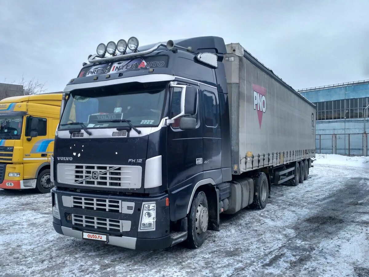 Куплю тягач авто ру. Volvo fh13 сцепка. Volvo FH 12 440 сцепка. Volvo fh12 с полуприцепом. Седельный тягач Вольво 380.