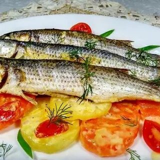 Кефаль с овощами в духовке