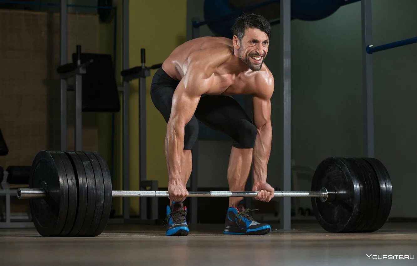 Атлет поднял штангу весом. Тяжелая атлетика штанга. Спортсмен штангист. Пол андерсон тяжелоатлет 2840. Поднятие штанги.