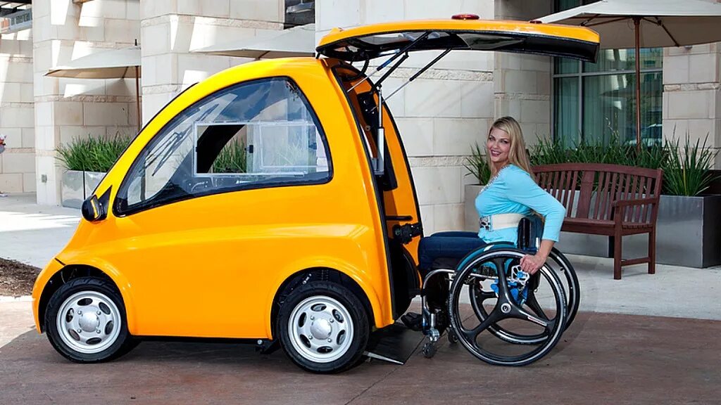 Какая машина для инвалидов. Автомобиль для инвалидов Kenguru. Кенгуру автомобиль для инвалидов колясочников. Электромобиль Кангару. Электрокар для инвалидов.