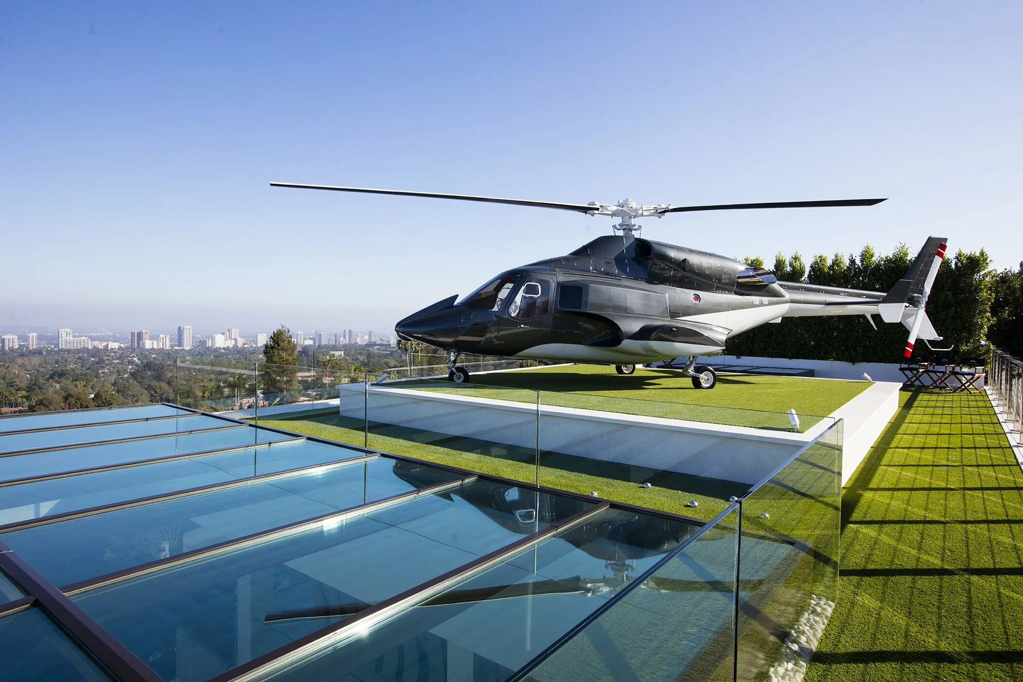 Вертолетная площадка на крыше. Лос анджелес вертолетная площадка. 924 bel air rd, лос-анджелес,. airbus helicopters h155. мрия вертолет.