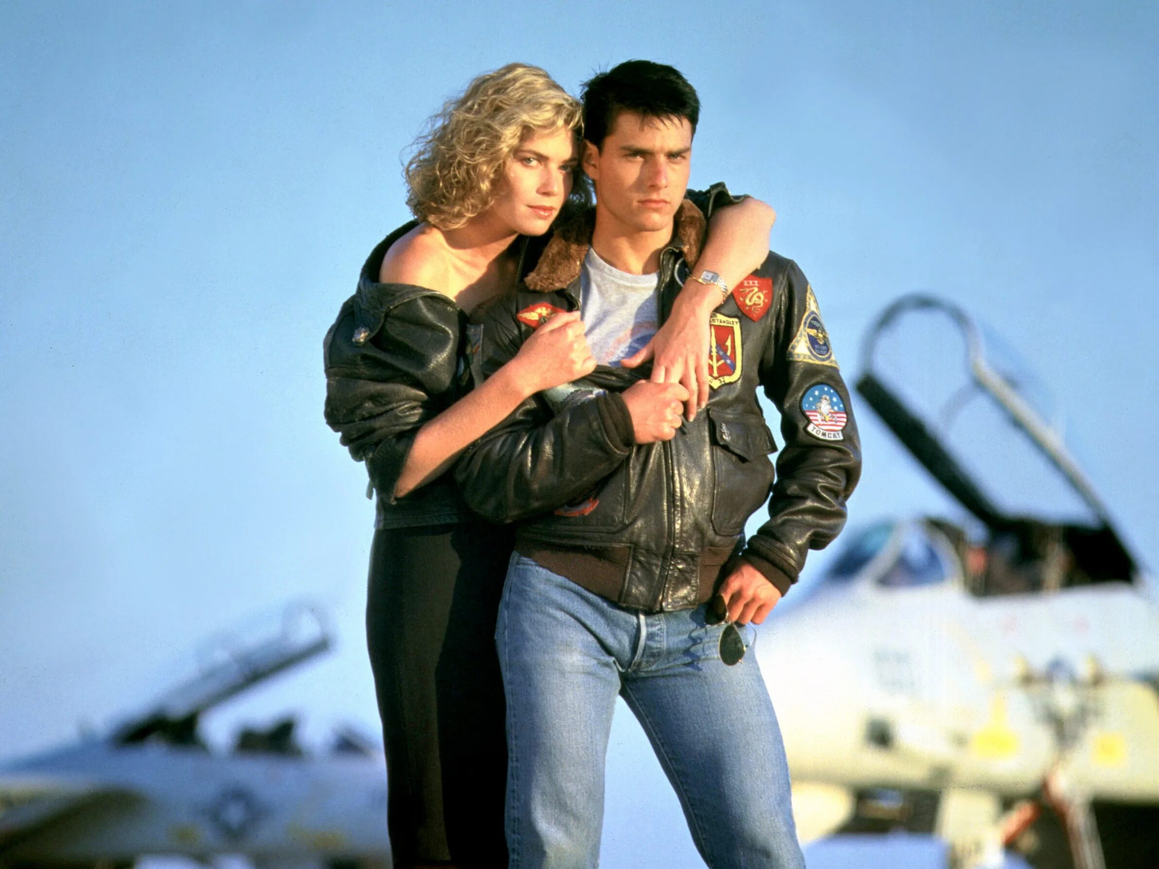 Лучший стрелок два. Том Круз Top Gun 1986. Келли МАКГИЛЛИС лучший стрелок. Том Круз 1986 лучший стрелок.