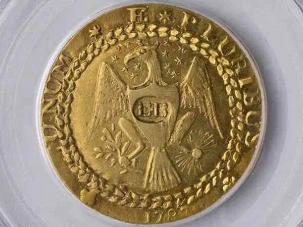 Древнейшая золотая монета 5 букв. Испанский золотой Дублон. Золотой Дублон Брашера монета. Золотая монета Испании 1787 Carol. Старинная монета Дублон.