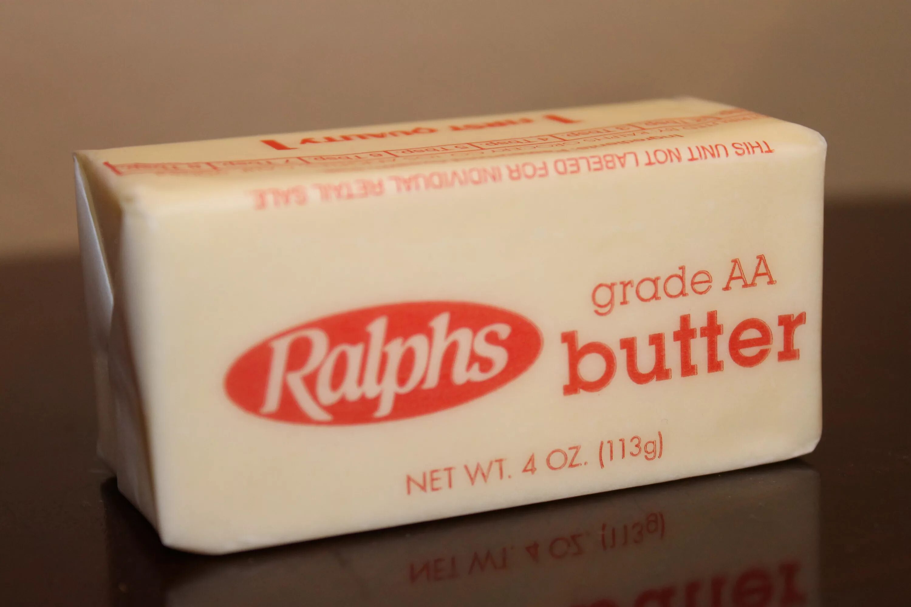 Under the butter. Under the butter