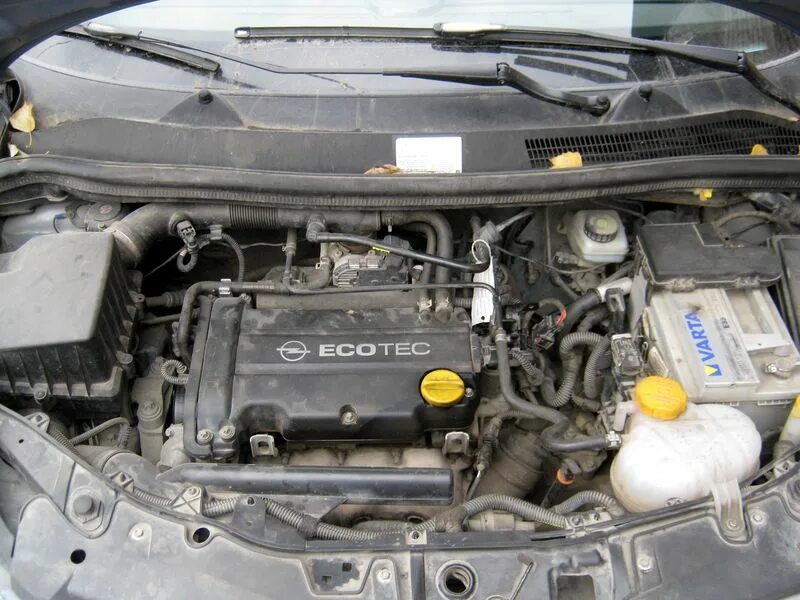 Двигатель opel 1.2. Двигатель Опель Корса д 1.4. Opel Corsa c двигатель 1.4. Моторный отсек Опель Корса 2007. Двигатель Опель Корса 1.4 z14xep.