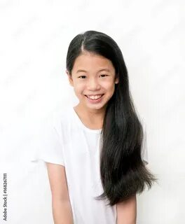 Загрузите стоковую фотографию «Portrait of beautiful young Asian teenage...