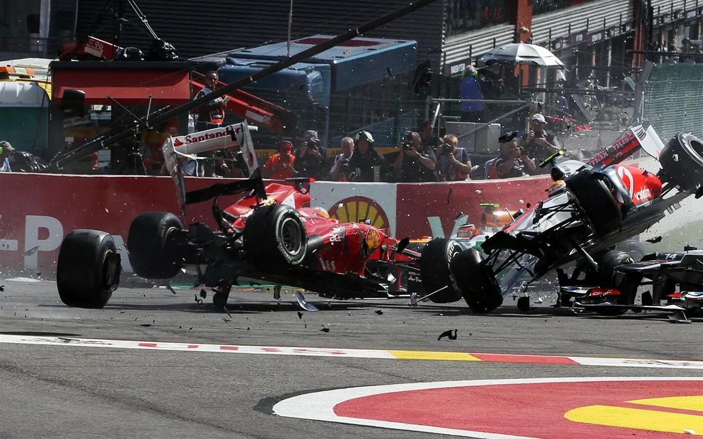 Look that car over there crash. F1 Ferrari crash. Болиды ф1 2012.