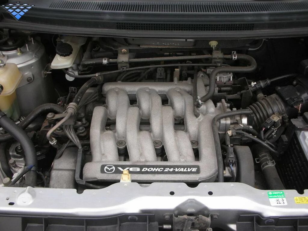 Двигатель мпв 2.5. Mazda mpv 3.0 под капотом. mazda mpv под капотом. мазда мпв 2.5 бензин. mazda mpv v6 2.5 подкапотка.