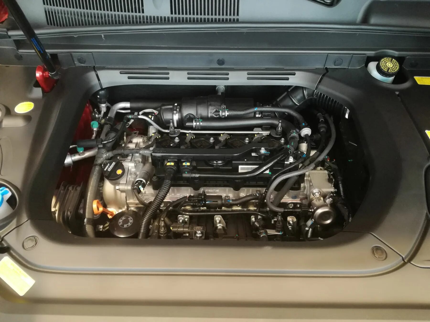 Джили атлас какие моторы. Распорка geely emgrand x7. Geely atlas 2. Geely atlas pro 1. Geely atlas pro двигатель.