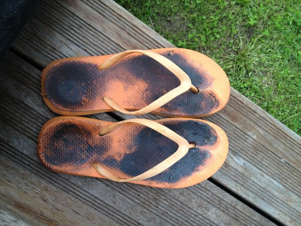 Worn Flip Flops. Worn Dirty Flip Flop. Well worn Flip Flops. Dirty feet in Flip-Flop. Dirty worn