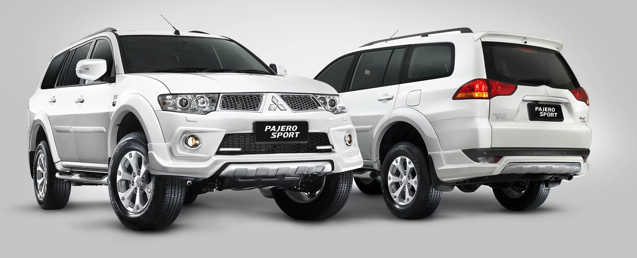 Mitsubishi pajero sport бензин. Mitsubishi Pajero Sport 2 обвес. Обвес Паджеро спорт 2. Mitsubishi Pajero Sport Limited. Mitsubishi Pajero Sport Dakar.