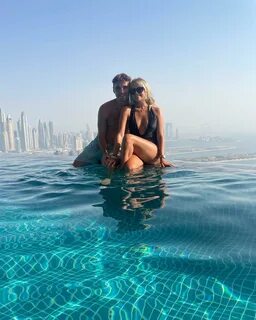 Lucy Fallon wows in daring swimsuit as she cuddles up to boyfriend Ryan on anoth