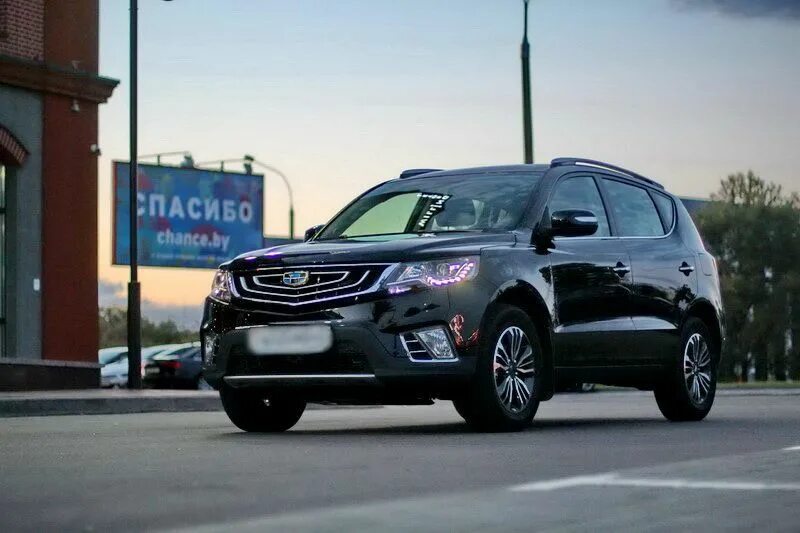 Джили х50 отзывы. Машина Джили х50. Джили х60. Джили раф4. Geely Emgrand x7 коричневый.