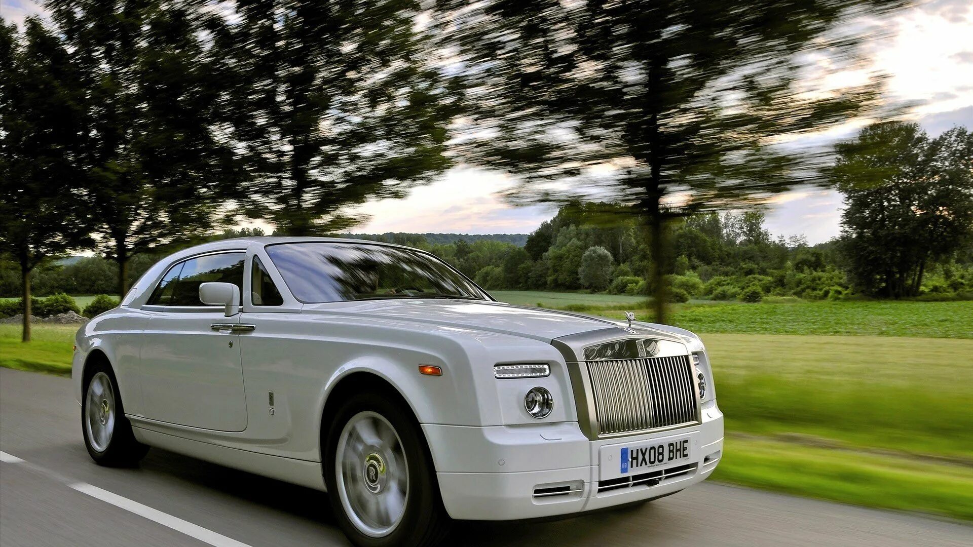 Где роллс ройс. Роллс Ройс Фантом купе. Rolls Royce Phantom 2008. Rolls Royce Phantom 2003 белый. Rolls Royce 2.