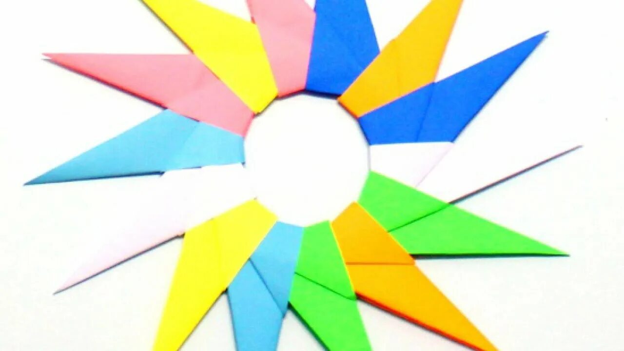 Оригами солнышко. Оригами солнце. Оригами солнце из бумаги. Солнышко оригами из бумаги.