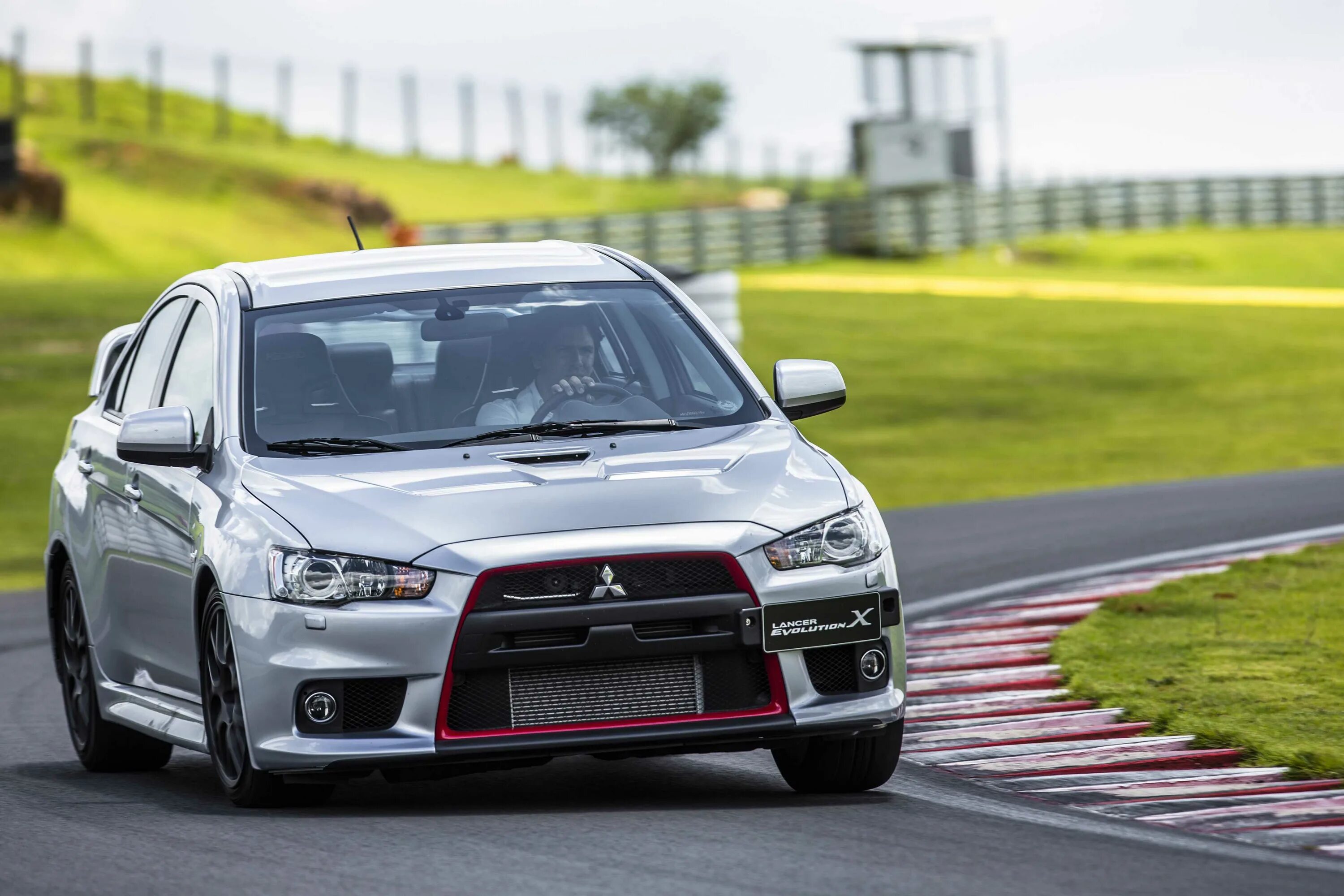 Mitsubishi Lancer Evolution 10. Митсубиси Лансер 10 EVO. Митсубиши Лансер эко 10. Mitsubishi Lancer Evolution x. Mitsubishi lancer фото