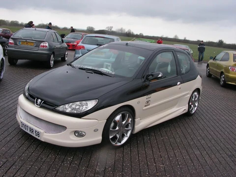 Тюнингованная пежо. Peugeot 206 tuning. обвес на пежо 206. peugeot 206 tuned. пежо 206 св.