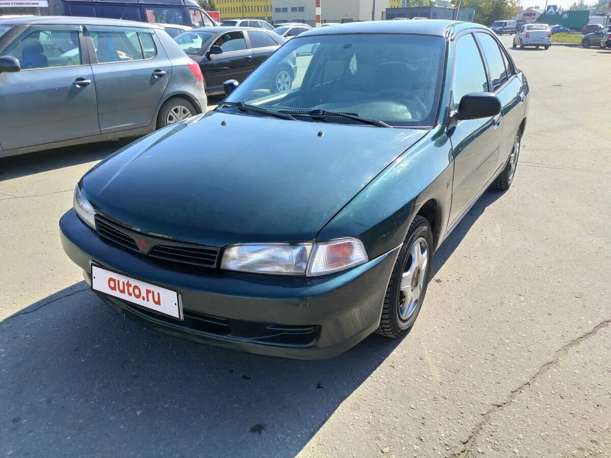 митсубиси мираж хэтчбек 1999. митсубиси мираж 1999. митсубиси мираж 1999 год. митсубиси мираж 1999 год. митсубиси мираж 1999 седан.