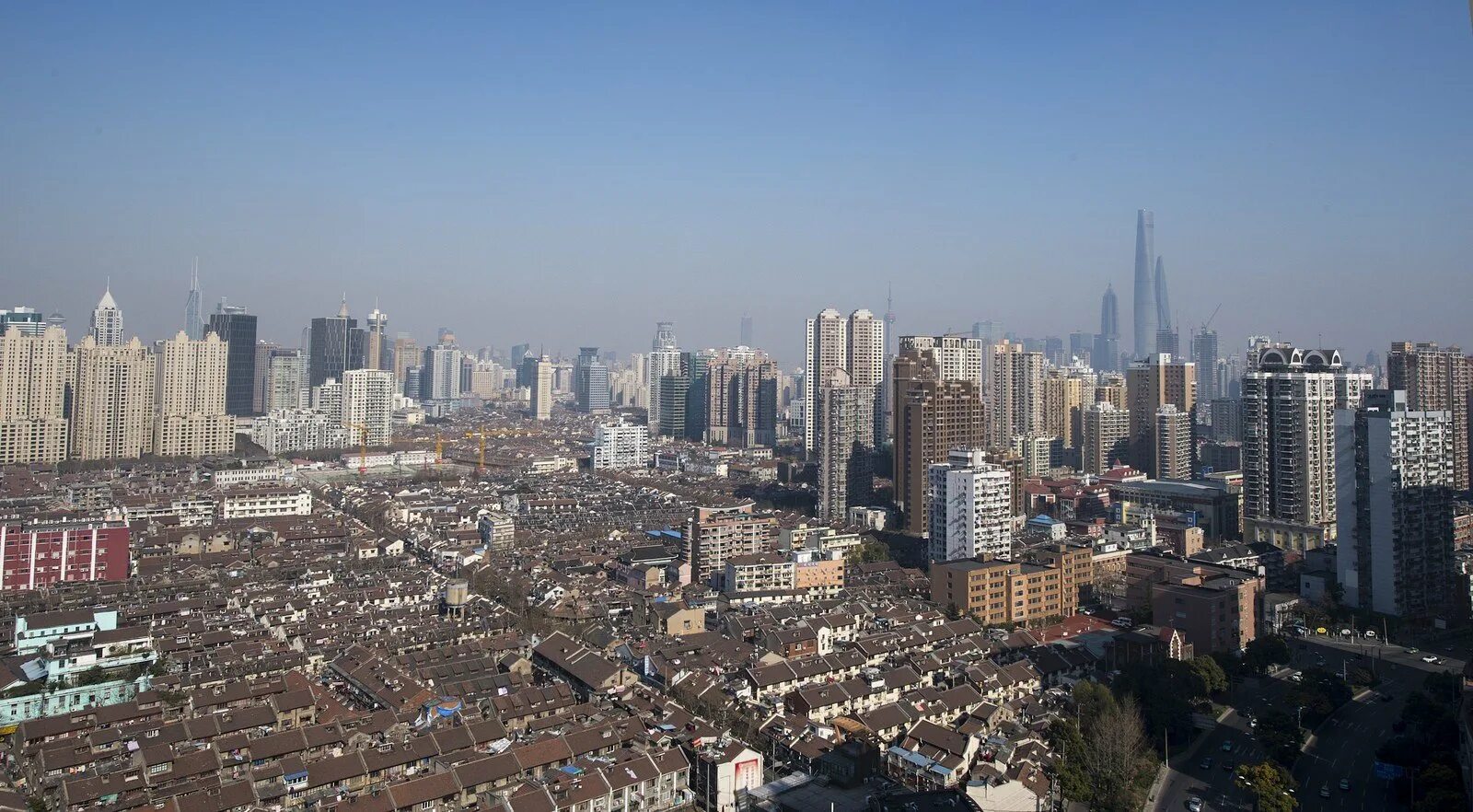 Шанхай оренбург. Шанхай фото 2000. Шанхай Оренбург фото. Шанхай фото жилых кварталов. Шанхай фото с воздуха.