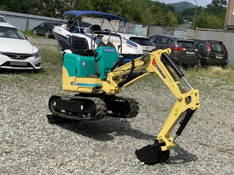 Yanmar sv13. Yanmar sv15 зеленый. Японский мини экскаватор. Японская мини спецтехника. Купить японский экскаватор