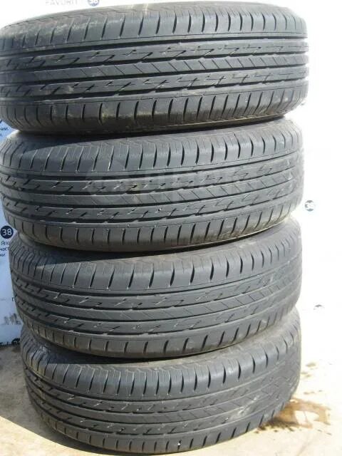 Шины б у 195 65 r15. Bridgestone 195/65r15. Шины Бриджстоун летние 195/65 r15. Honda freed 195/65r15. Шина Бриджстоун в390 195/65/15 фото.