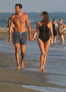 Ilaria D’Amico in Black Swimsuit on the beach in Marina di Massa. 