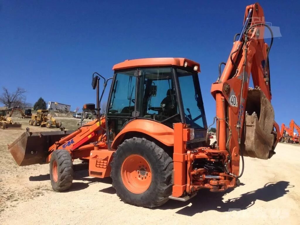 Экскаватор-погрузчик Fiat-Kobelco b 110. Экскаватор погрузчик Fiat Kobelco. Экскаватор Fiat Kobelco b95 Evolution. Фиат Кобелко fb95.