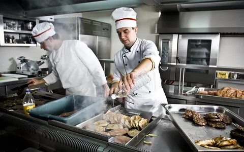 A chef cooks food