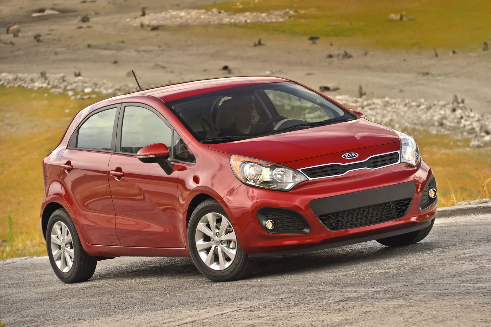 Кия рио 2012 год. Kia Rio 2012. Kia Rio Hatchback 2012. Kia Rio 2. Kia Рио седан 2012.