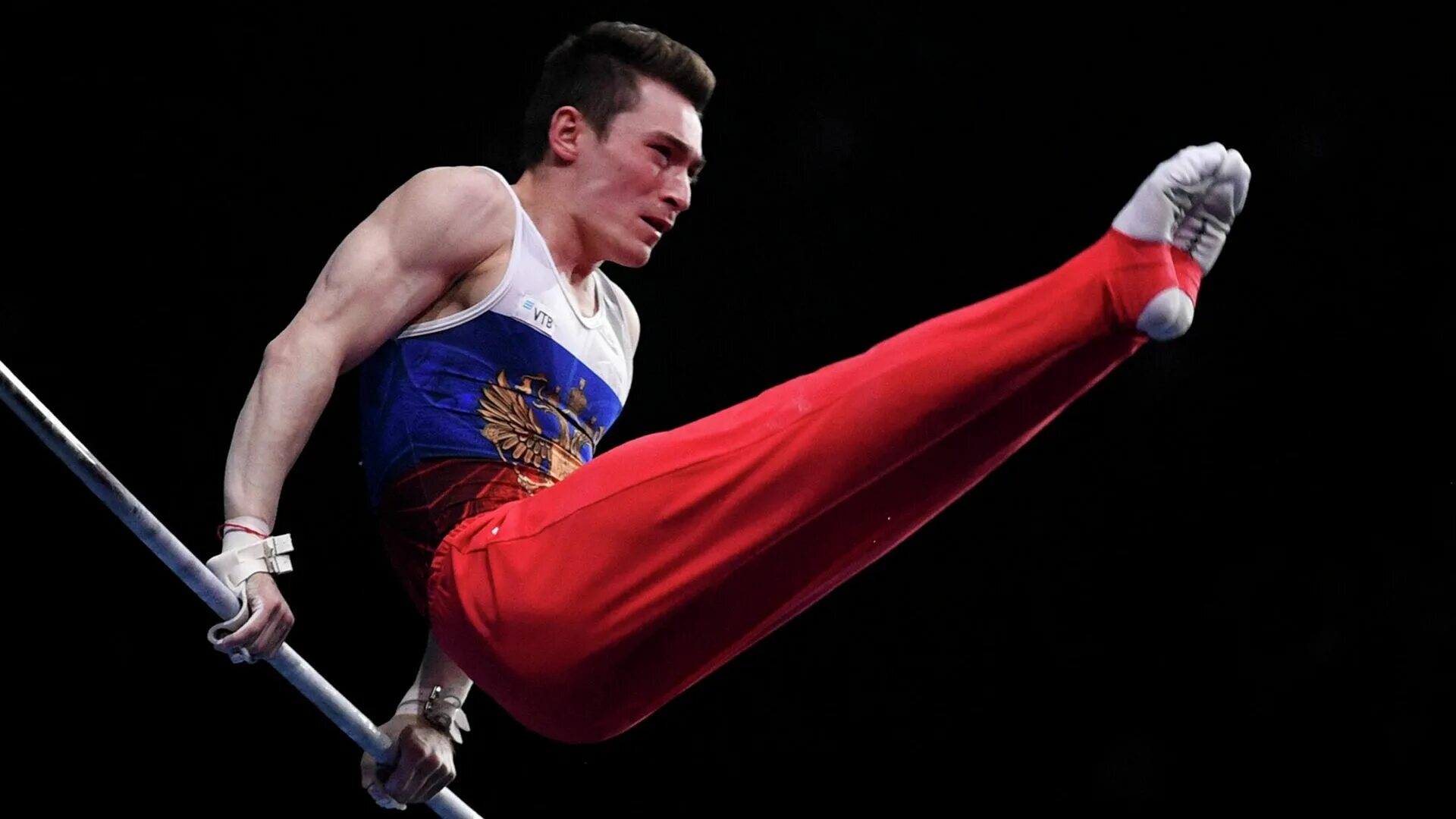 знаменитый гимнаст 9 букв