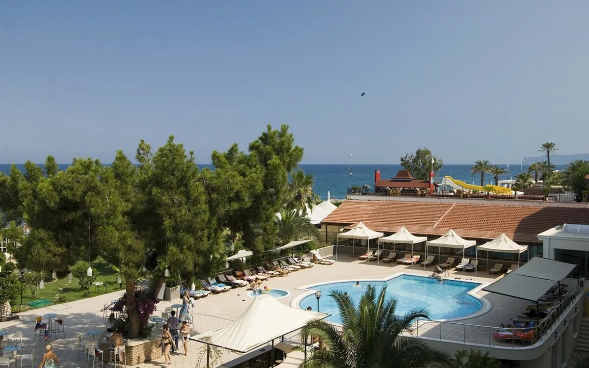 Smart club marakesh beach hotel 4. Отель марракеш турция бельдиби. Клуб марракеш бич отель кемер. Club marrakech beach hotel 4. Club belant).