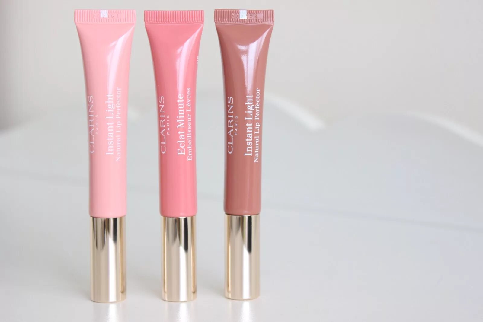 Clarins natural Lip Perfector 1. Clarins instant Light natural Lip Perfector. Clarins natural Lip Perfector оттенки. Clarins Lip Perfector 05. Lip perfector 25 купить