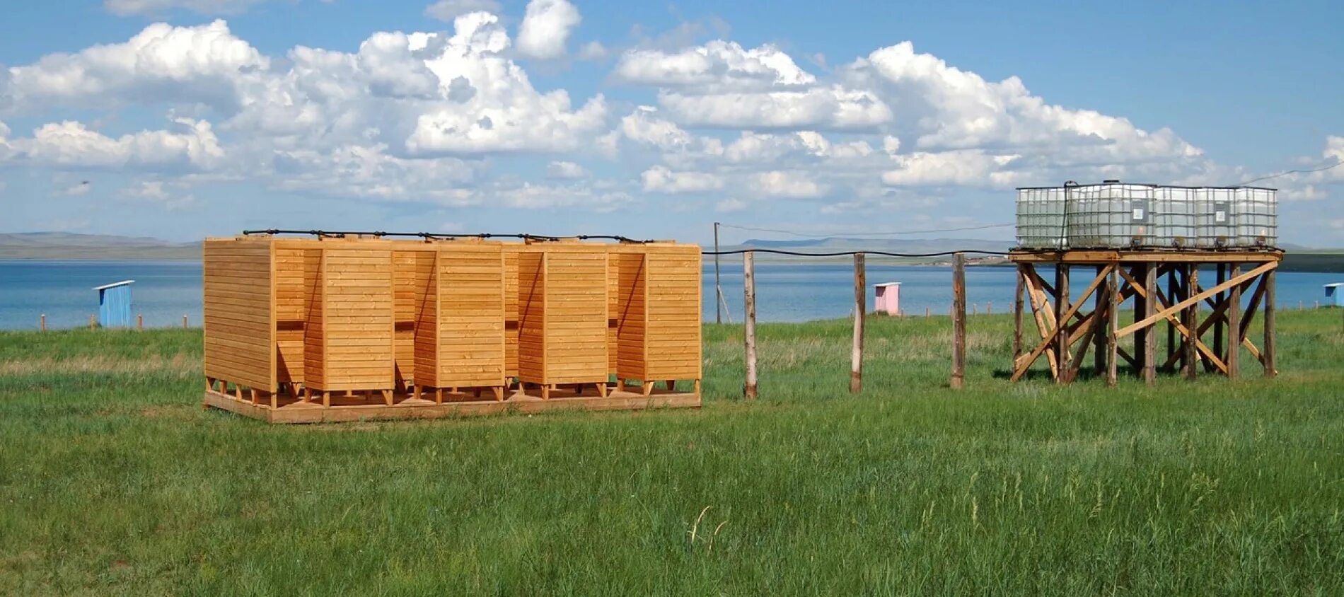 Озеро шира домики. Белё Хакасия палаточный городок. Лазурный берег озеро беле Хакасия. Лазурный берег беле Хакасия база отдыха. Хакасия озеро беле палаточный городок.