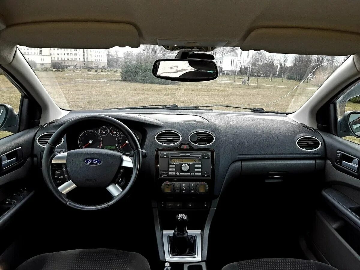 Тест форд фокус 2. Ford Focus 2 Ghia комплектация. Ford Focus 2 2009 chia. Форд фокус 2 2006 комплектация Ghia. Форд фокус седан 2006 салон.