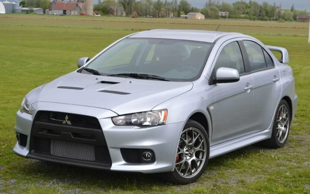 Митсубиси купить б лансер. Mitsubishi Lancer 2011. Митсубиси Эволюшн 2011. Лансер 10 Эволюшн. Лансер Эволюшн 2011.