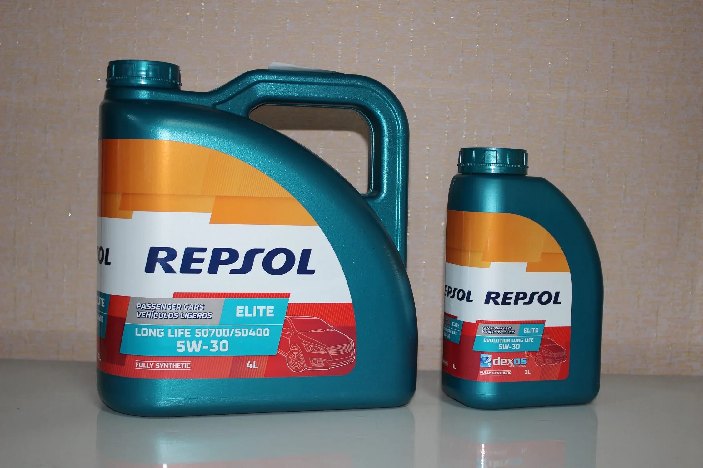 Repsol long life 5w 30. Repsol Rp Elite Evolution long Life 5w30. Масло моторное 5w30 Repsol Elite long Life. Масло моторное Repsol Elite long Life 50700\50400 5w30 4л. Масло Репсол Элит Эволюшн Лонг лайф 5w30.