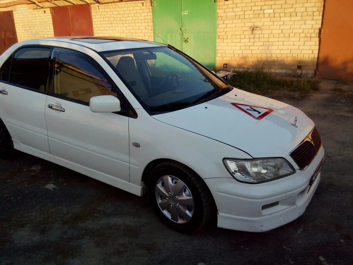 Mitsubishi lancer 2001. Митсубиси Лансер 2001г. Митсубиси Лансер 2001 года. Митсубиши Лансер 2001 год.