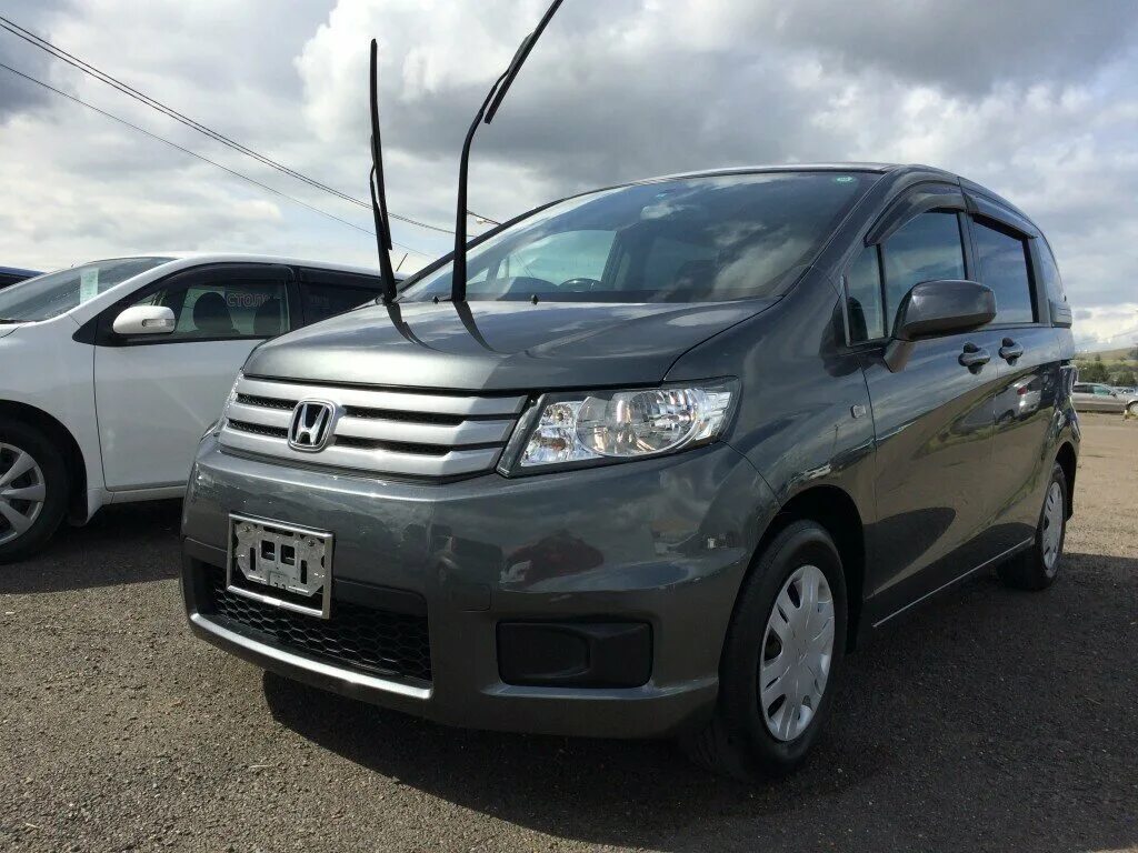 Фрид 2012 года гибрид. Honda freed 2012. Хонда Фрид 4 ВД. Honda freed Spike. Honda Spike 2012.