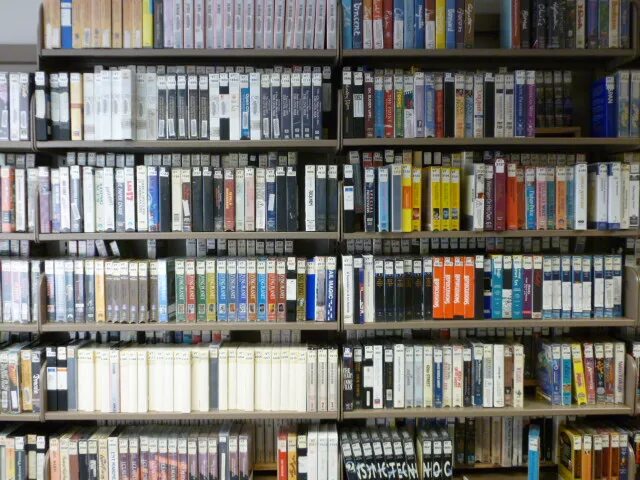 Архив видеозаписей. Фото видео архив. Архив видеозаписей фон. VHS collection Shelf.