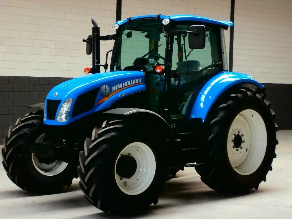 Трактор New Holland t5. Трактор New Holland t600. New Holland t4050v трактор. Трактор New Holland 7480.