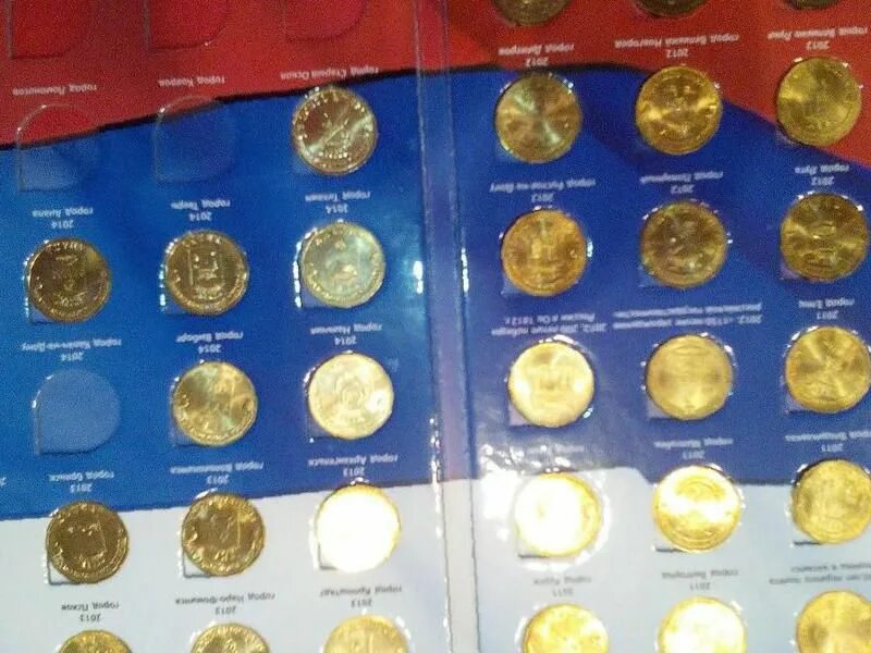 старинные монеты с женской головой.