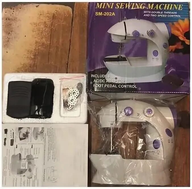 Мини швейная машинка sm 202a. Mini Sewing Machine SM-202a. Швейная машинка SM-202a. Машина для шитья Mini Sewing Machine SM -202а. Швейная машина SM-202a маховик.