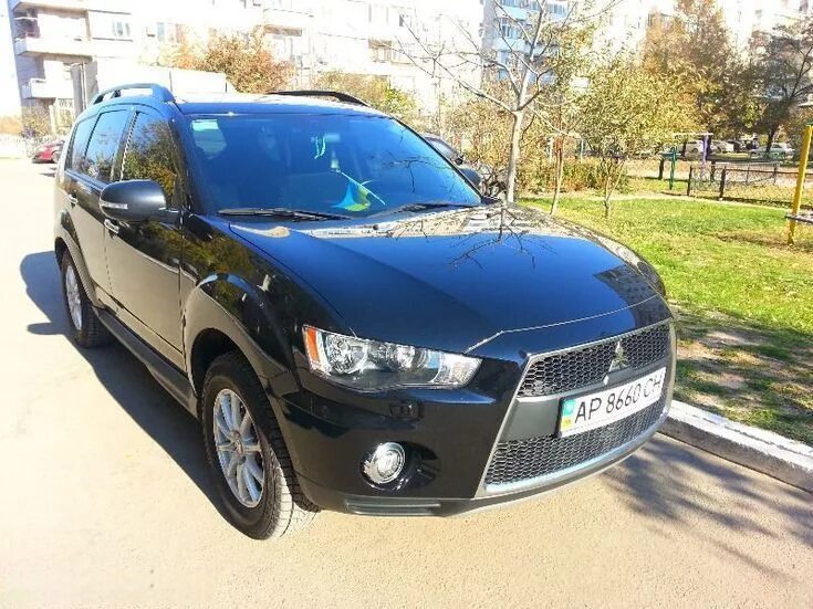 Mitsubishi outlander xl 2012. Аутлендер XL 2012. Mitsubishi Outlander XL 2012 черный. Аутлендер ХЛ 2012. Outlander XL 2012.