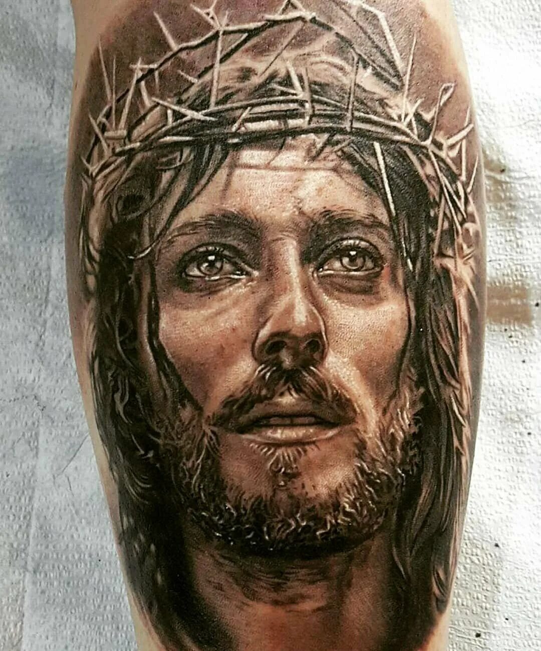 Татуировка христа. Татуировка христа. Таттоо лицо иисус христа. Татуировка иисуса христа. Тату бога иисуса христа.