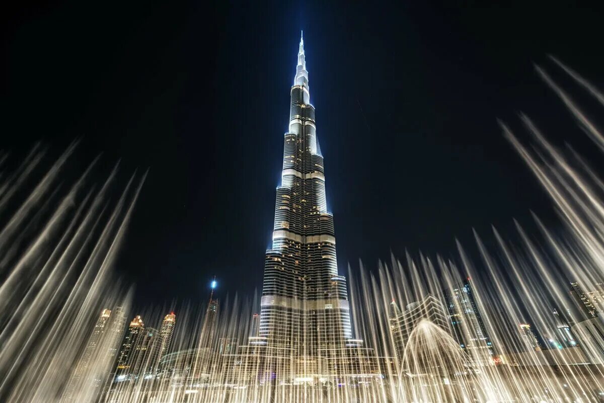Бурдж-Халифа Дубай. Небоскрёб Бурдж-Хали́фа (Дубай). Башня Бурдж-Халифа (Дубай, ОАЭ, Архитектор Эдриан Смит). Дубай здание Бурдж Халифа.